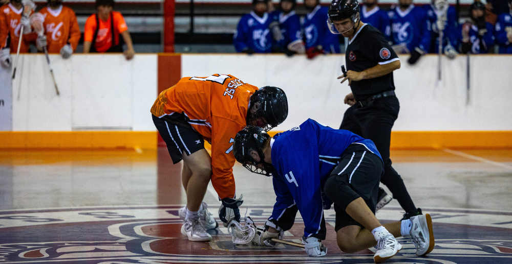Faceoff takes place at the beginning of a game at the BC Summer Games.